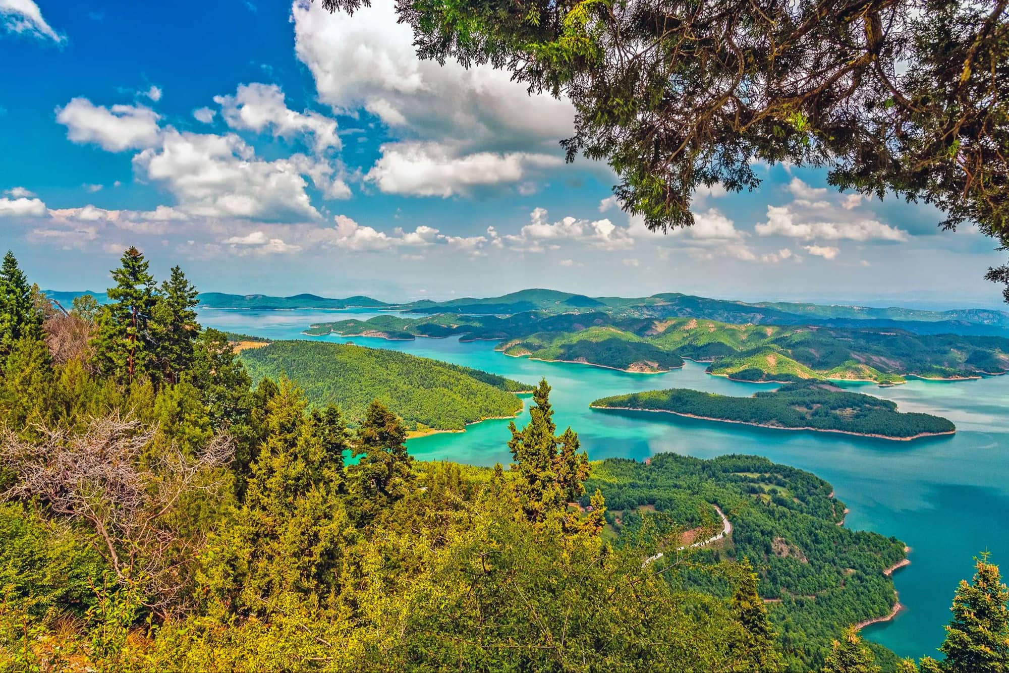 Lake Plastiras among fir-covered mountains